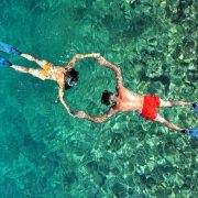 Romantic couple snorkeling in Phi Phi island, Thailand
